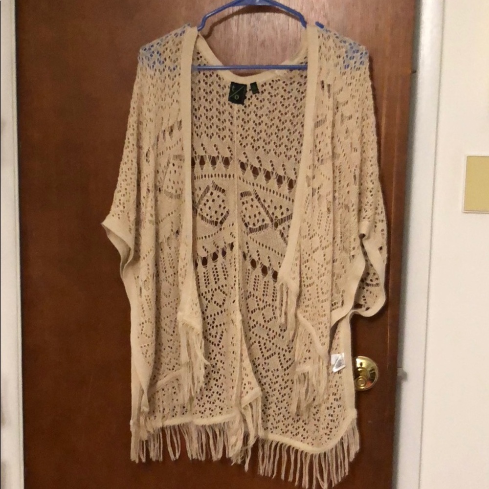 A cardigan. Used twice! In good condition!